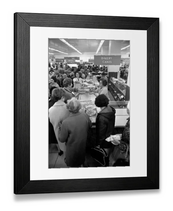 Framed Print : Food: Industrial Disputes: Scores of shoppers line the counter at Lewis