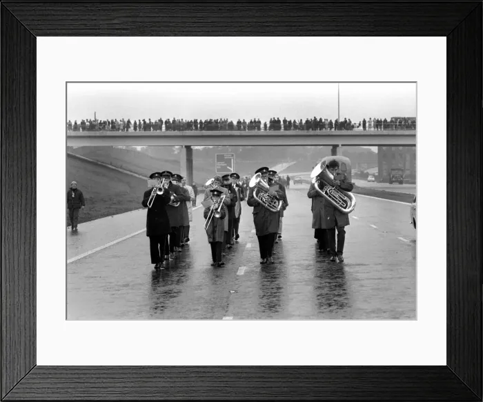 Framed Print : Charity: Walking. Off on the M61 the walkers set off on a sponsored walk to help raise