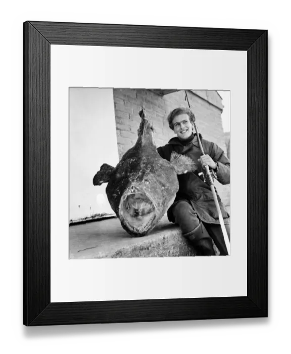 Framed Print : Sport: Fishing: Turkey farmer Tim Clark (22) pictured with the 58lb 50z Angler fish that Framed Print : Sport: Fishing: Turkey farmer Tim Clark (22) pictured with the 58lb 50z Angler fish that