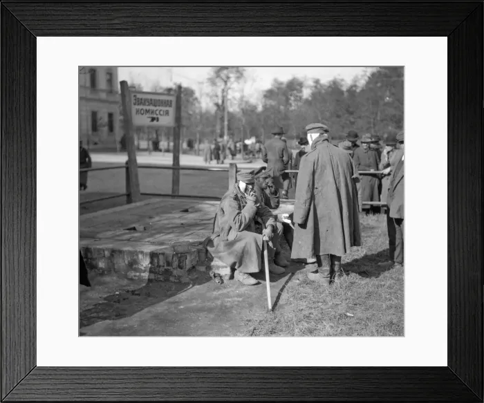 Framed Print : A wounded Russian and Austrian soldiers sitting side by side at Lemberg September 1914