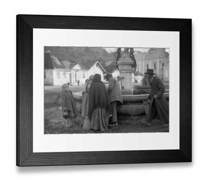 Framed Print : Residents collect water from the spring in the market place in Halicz Galicia