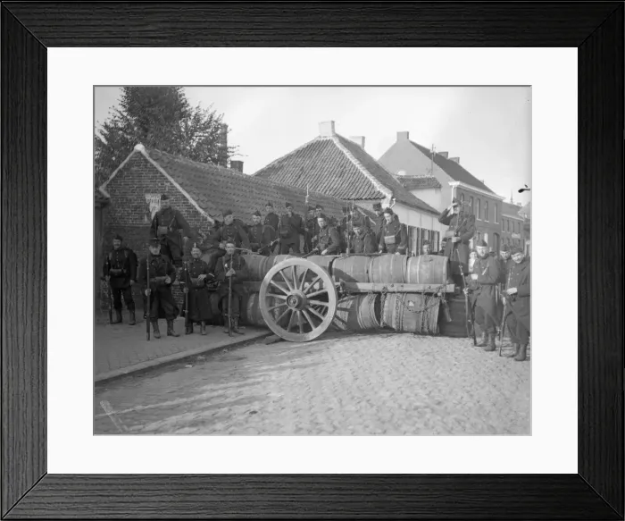 Framed Print : Belgian soldiers man a barriacde made of barrels in Zele following the fall of Brussels Framed Print : Belgian soldiers man a barriacde made of barrels in Zele following the fall of Brussels