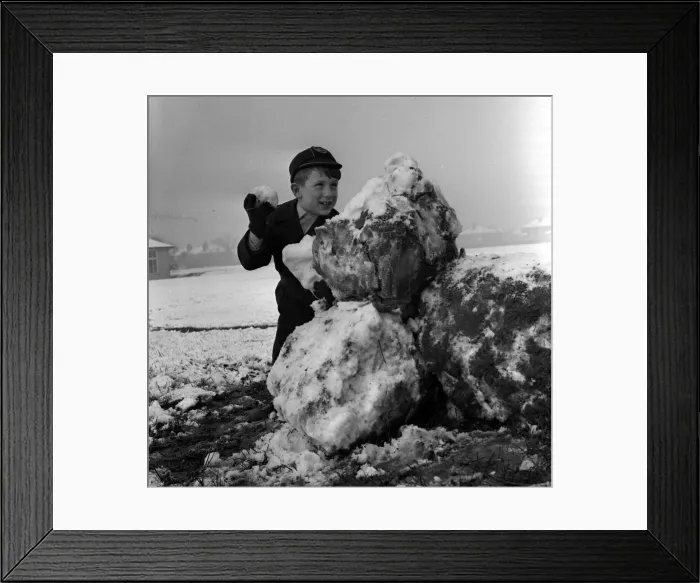 Framed Print : Child Playing in the snow December 1961 Six years old Jack Frost was having Framed Print : Child Playing in the snow December 1961 Six years old Jack Frost was having