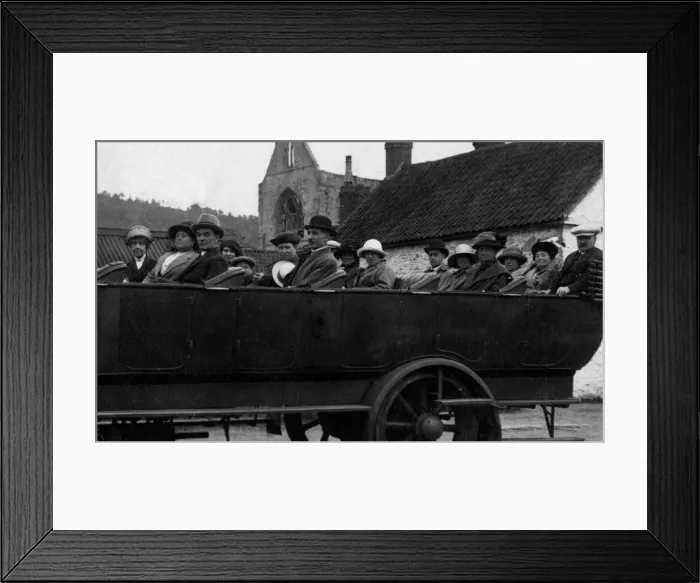 Framed Print : A group of people take their places on the charabanc ready for a day out Framed Print : A group of people take their places on the charabanc ready for a day out