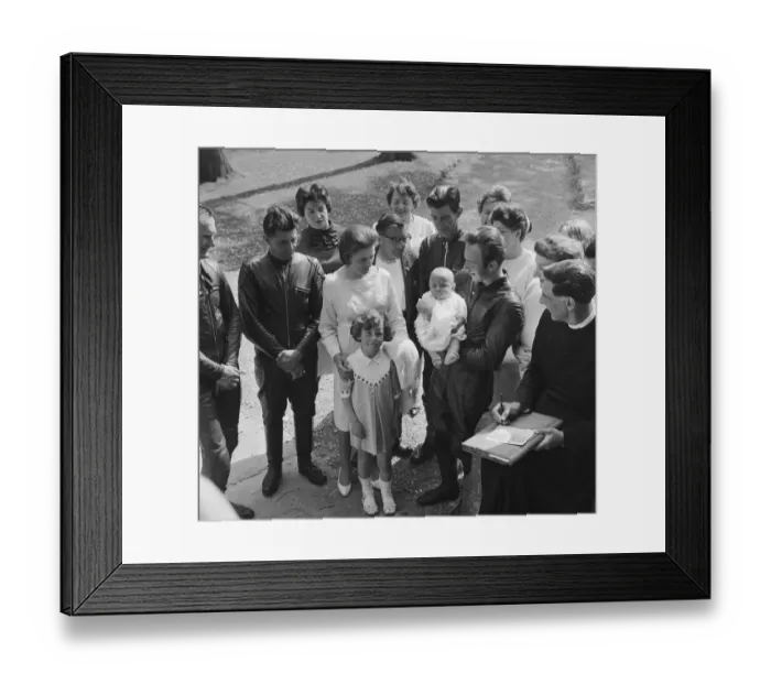 Framed Print : Isle of Man TT Races. 50cc rider Brian Gleed has his daughter christened on the island Framed Print : Isle of Man TT Races. 50cc rider Brian Gleed has his daughter christened on the island