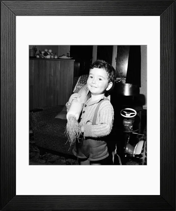 Framed Print : Child holds prize winning leek 2nd October 1965 Framed Print : Child holds prize winning leek 2nd October 1965
