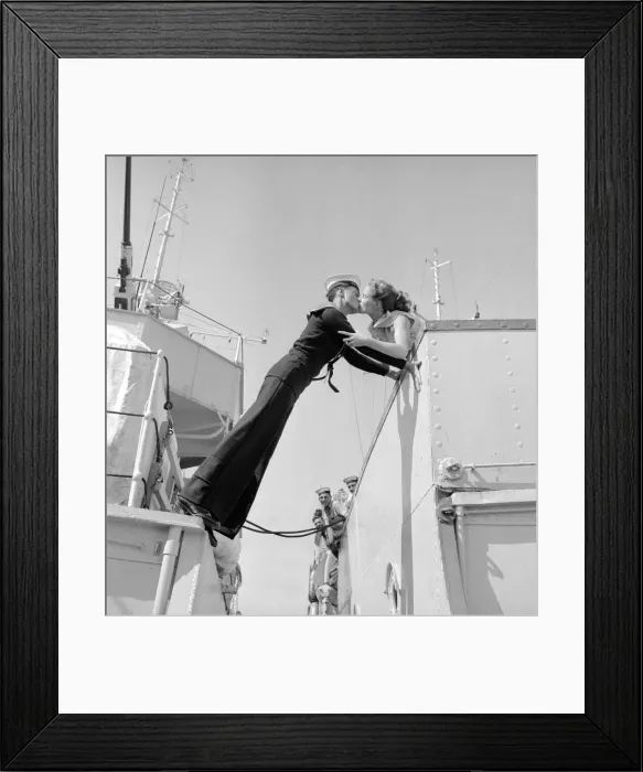 Framed Print : Twenty year old Engineer Mechanic Alan Purton of the Royal Navy stretches across the gap