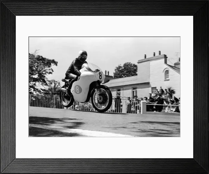 Framed Print : Isle of Man TT Races - Junior International. Mike Duff goes over Ballaugh Bridge Framed Print : Isle of Man TT Races - Junior International. Mike Duff goes over Ballaugh Bridge