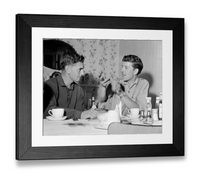 Framed Print : TT Riders Jim Redman (light shirt) and Phil Read. 29th June 1965