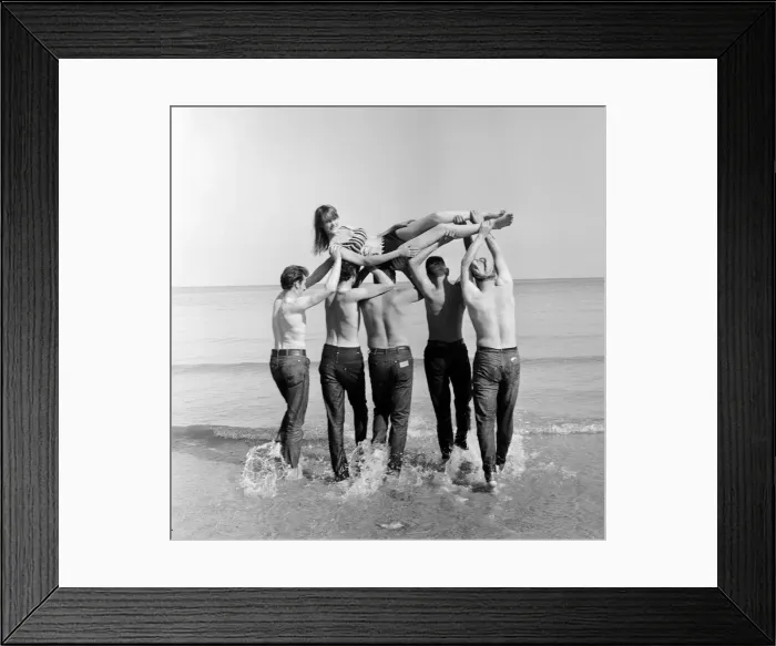Framed Print : Isle of Man TT Races 1967. TT Riders dunk 19 year old Joyce Milton in the sea after Framed Print : Isle of Man TT Races 1967. TT Riders dunk 19 year old Joyce Milton in the sea after