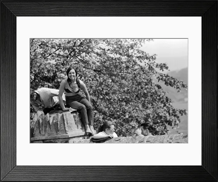 Framed Print : Isle of Man TT Races -Junior 350cc Event. Race fan Ann McCullough at Quarter Bridge Framed Print : Isle of Man TT Races -Junior 350cc Event. Race fan Ann McCullough at Quarter Bridge