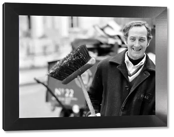 Is work wonderful?. Feature. At work in Kensington West London road sweeper John Sheppard