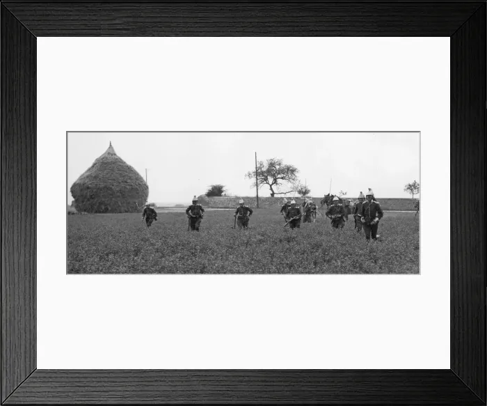 Framed Print : French cavalrymen dismounted seen here running across a corn field in Flanders Framed Print : French cavalrymen dismounted seen here running across a corn field in Flanders