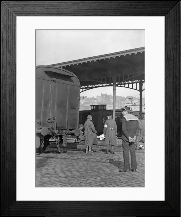 Framed Print : British wounded soldiers seen here at the cross channel railway station in Boulogne await Framed Print : British wounded soldiers seen here at the cross channel railway station in Boulogne await
