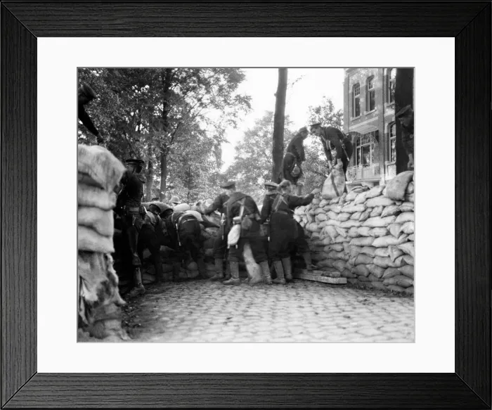 Framed Print : Marines from the Naval Brigade seen here building a sandbag barricade behind which they