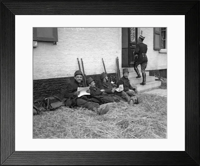 Framed Print : Belgian soldiers seen here resting and catching up with the news at Diest