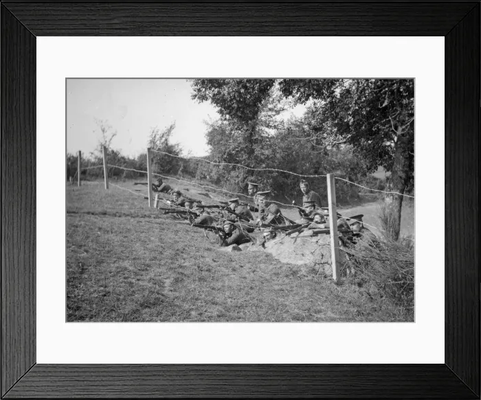 Framed Print : British soldiers waiting to fire on enemy from behind barbed wire Framed Print : British soldiers waiting to fire on enemy from behind barbed wire