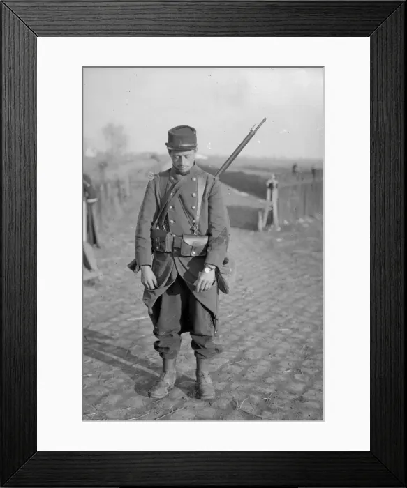 Framed Print : French soldier who has placed around his wrist his identification disc instead of his