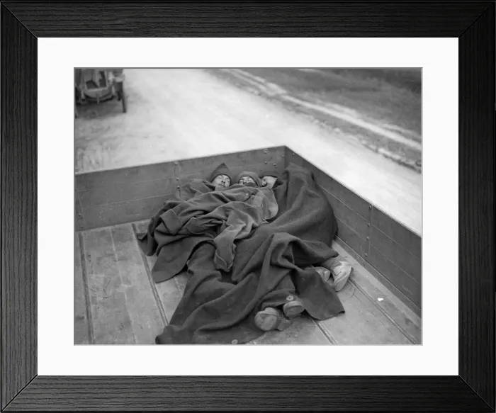 Framed Print : Soldiers of the Army Service Corp asleep in the rear of a lorry following a hard days Framed Print : Soldiers of the Army Service Corp asleep in the rear of a lorry following a hard days