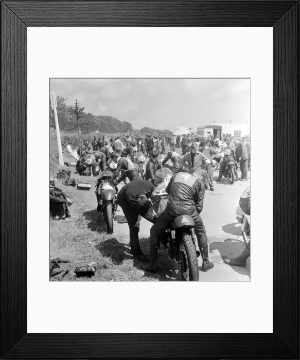 Framed Print : Isle of Man TT Races - Junior International. Riders preparing their bikes Framed Print : Isle of Man TT Races - Junior International. Riders preparing their bikes