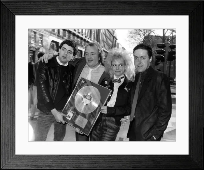 Framed Print : Cast of the BBC comedy satire series Not the nine oclock news celebrate after they Framed Print : Cast of the BBC comedy satire series Not the nine oclock news celebrate after they
