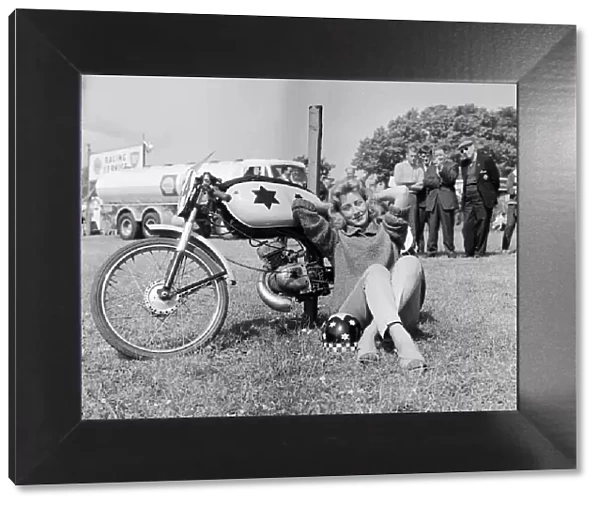 Beryl Swain waiting to weigh in for the 50cc race. 7th June 1962