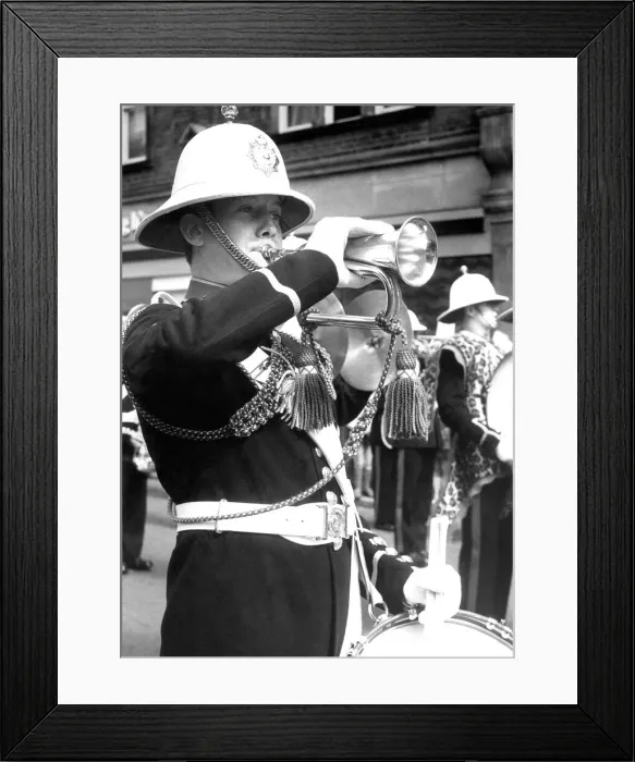 Framed Print : A bandsman playing the bugle and snare drum in July 1977 Framed Print : A bandsman playing the bugle and snare drum in July 1977