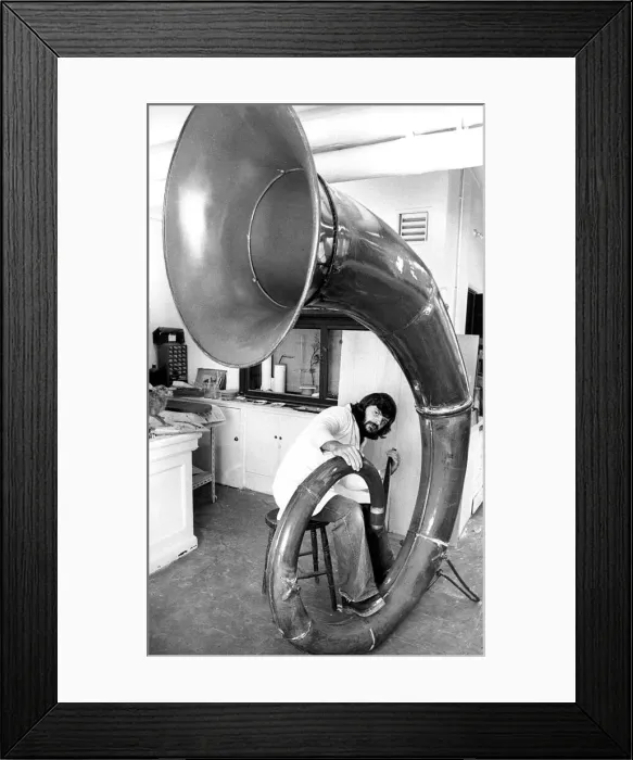 Framed Print : Museum technician Richard Miller was to knock out the dents in this giant auyetephone Framed Print : Museum technician Richard Miller was to knock out the dents in this giant auyetephone