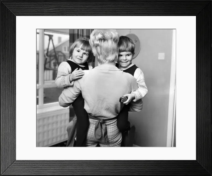 Framed Print : Children: Boy and girl: Young twins holding hands, running with happy expressions