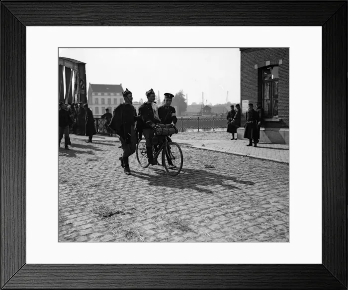 Framed Print : Though wounded this Belgian soldier could bicycle with a little assistance from his Framed Print : Though wounded this Belgian soldier could bicycle with a little assistance from his