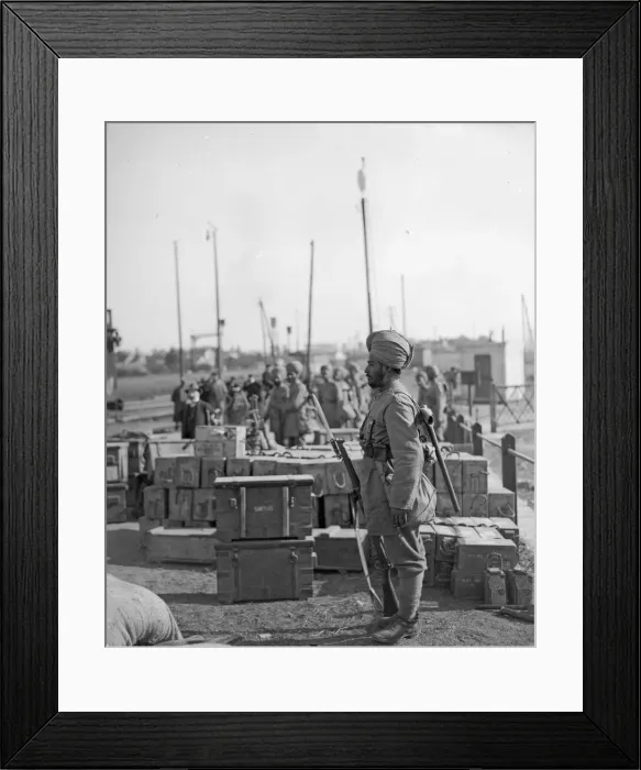 Framed Print : Sentry from the 3rd Lahore Indian Division seen here guarding ammunition boxes at their