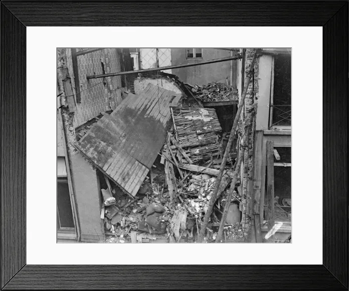 Framed Print : Bomb damage in Antwerp the result of one of the three air raids made on the city by Framed Print : Bomb damage in Antwerp the result of one of the three air raids made on the city by