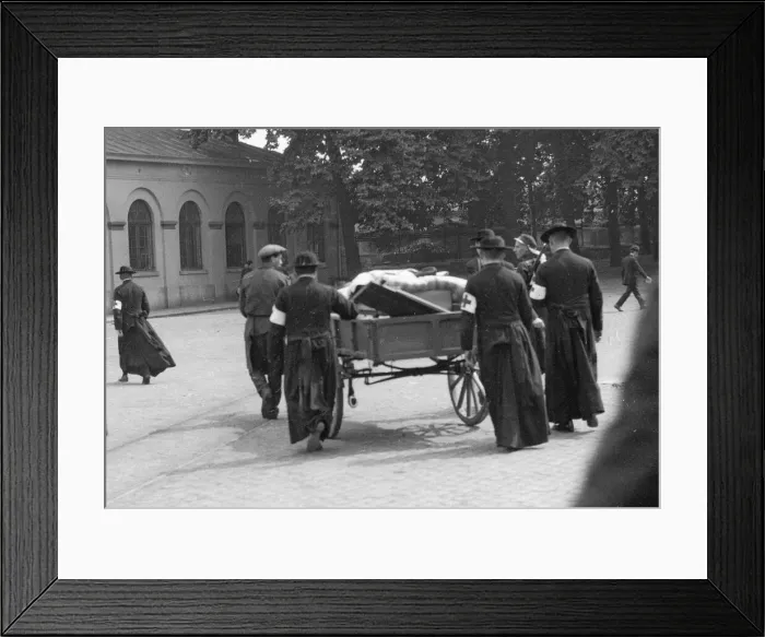 Framed Print : Red Cross priests conveying wounded on cart to hospital Circa August 12th 1914 Framed Print : Red Cross priests conveying wounded on cart to hospital Circa August 12th 1914