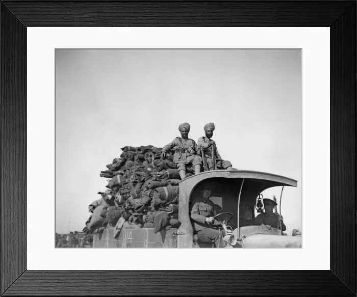 Framed Print : Soldiers riding on the top of a fully laden lorry. One of the supply train of the 3rd
