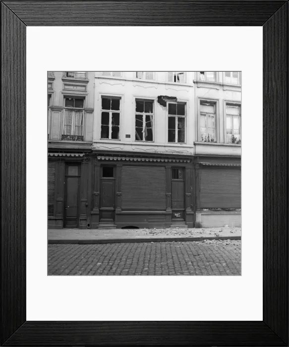Framed Print : A houses and shops damaged during the German bombardment of the centre of Antwerp Framed Print : A houses and shops damaged during the German bombardment of the centre of Antwerp