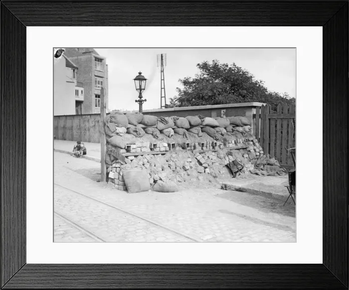Framed Print : Street barricade made from sacks and bricks set across one of the approach roads to