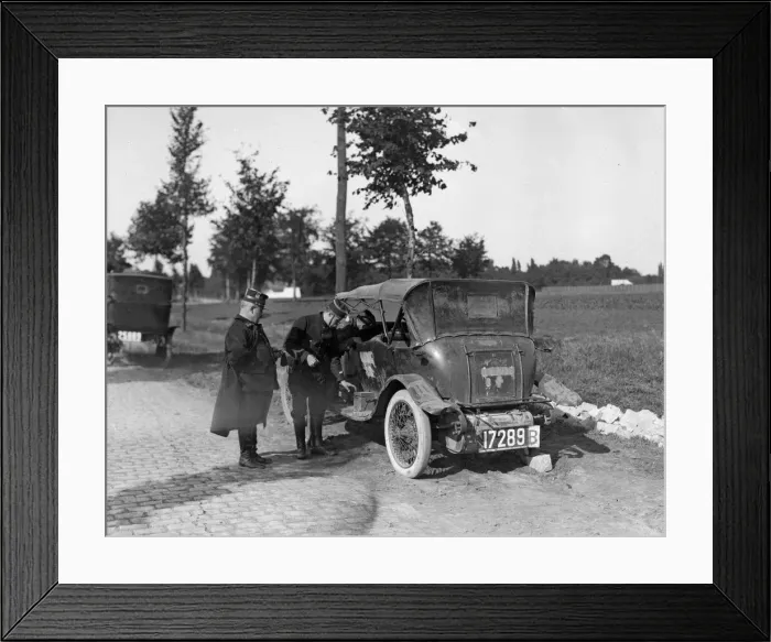 Framed Print : Belgium officers inspect a staff car which had been captured by the Germans along with Framed Print : Belgium officers inspect a staff car which had been captured by the Germans along with