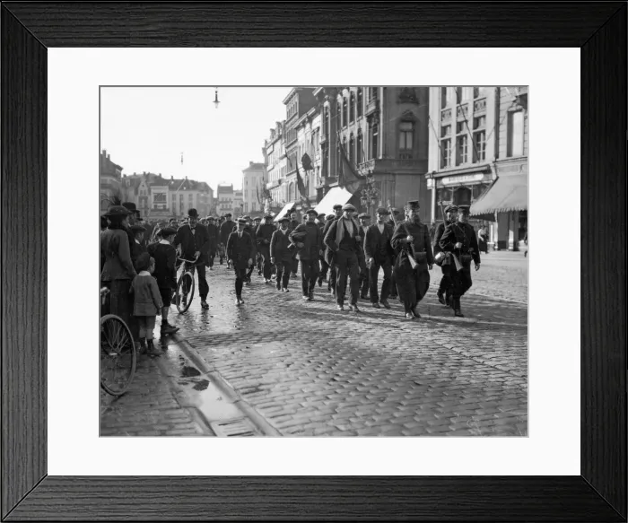 Framed Print : The last line of Belgian civilians called up to bolster the line march off into action Framed Print : The last line of Belgian civilians called up to bolster the line march off into action
