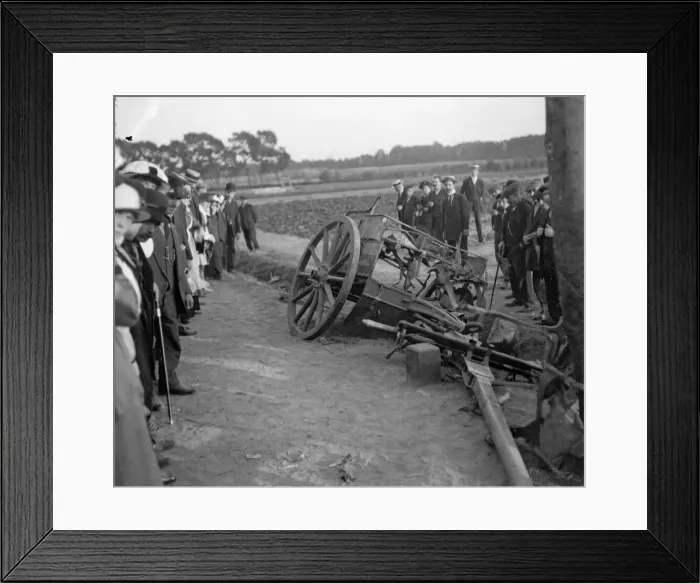 Framed Print : Locals examine a damaged and abandoned gun limber in the remains of the Belgium village Framed Print : Locals examine a damaged and abandoned gun limber in the remains of the Belgium village