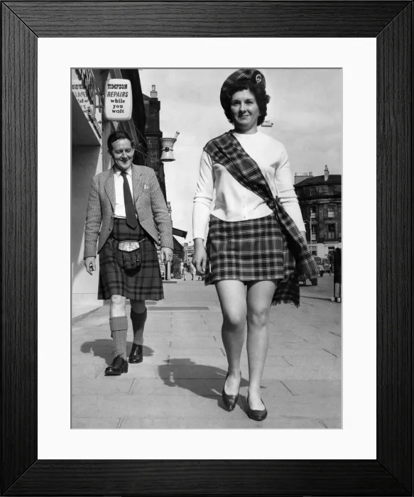 Framed Print : Shorty'kilts for export. Olive Lennen braves the looks from a highland gentleman as