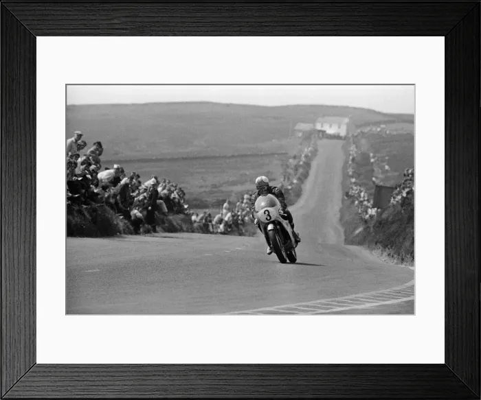 Framed Print : Isle of Man TT Races -Junior 350cc Event. Winner Mike Hailwood on his Honda
