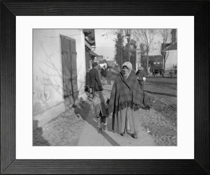 Framed Print : Mother and child in traditional dress seen here in the village of Halicz, in Galicia