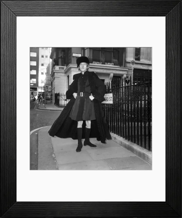Framed Print : People Men Humour. Fashion Clothing. Mr. Fish wearing a full-length leather maxi coat