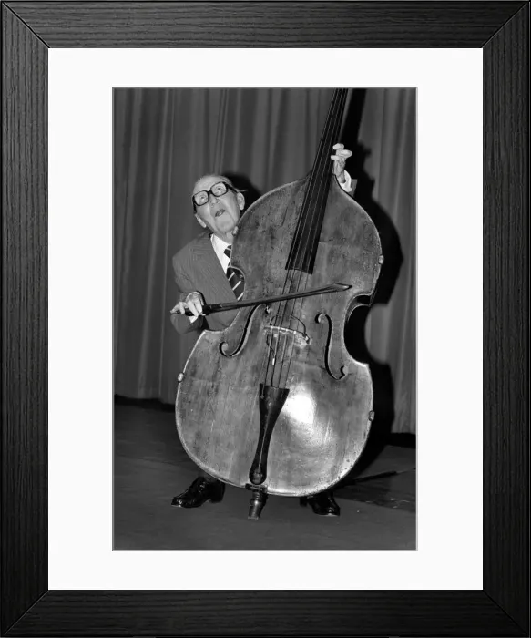Framed Print : Entertainment. Music. Arthur A. Askey playing the cello. February 1981 81-00677-001 Framed Print : Entertainment. Music. Arthur A. Askey playing the cello. February 1981 81-00677-001