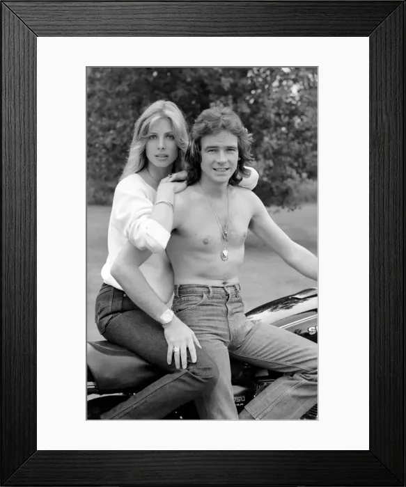 Framed Print : Barry Sheene: Time out for a few seconds between world champion motorcyclist Barry Sheene