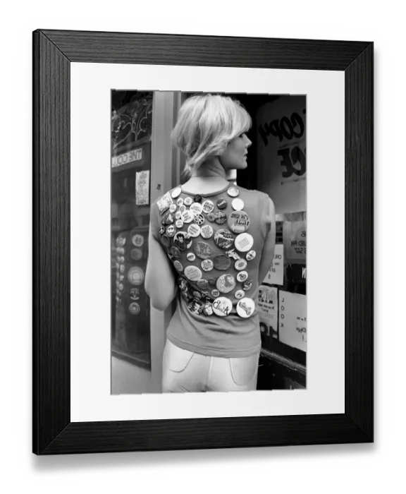Framed Print : People: Woman: Janine Andrews model, with badges from the Badge Shop in Convent Garden Framed Print : People: Woman: Janine Andrews model, with badges from the Badge Shop in Convent Garden