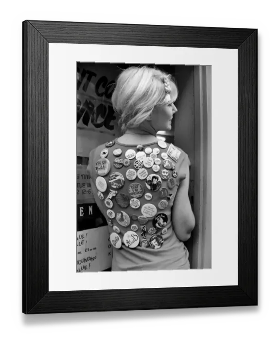 Framed Print : People: Woman: Janine Andrews model, with badges from the Badge Shop in Convent Garden