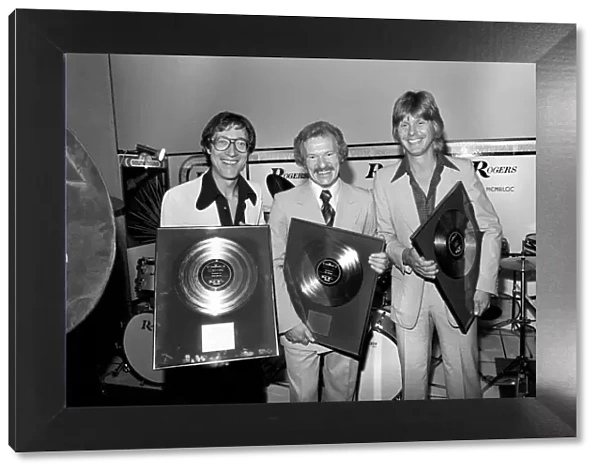 With their records left to right: Hank Marvin, Bert Weedon, and Joe Brown