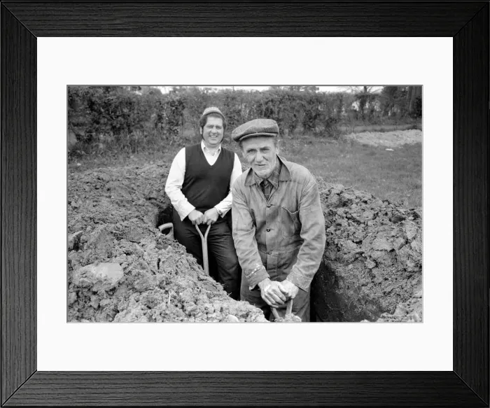 Framed Print : Is work wonderful?. Feature. Grave Diggers at work in the grave yard of Windlesham Church