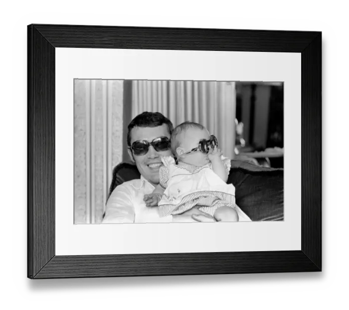 Framed Print : Boxer Alan Minter pictured at his Crawley Sussex home with his six month old baby